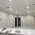 Professionally painted open-plan kitchen and dining area featuring flawless white walls and ceilings by S and R Painting Group in Cranbourne.
