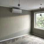 Flawless interior room painting project completed by S and R Painting Group in South East Melbourne, showing Dulux Oyster Linen wall paint and Dulux Berkshire White ceilings and trims.