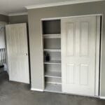 Flawless interior room painting project completed by S and R Painting Group in Narre Warren, showing Dulux Oyster Linen wall paint and Dulux Berkshire White Doors.