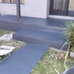 Freshly painted walkway and modern residential front porch entryway completed by S&R Painting Group in Rowville VIC using Berger Jet Dry dark charcoal.