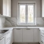 A White window painted in laundry of a luxury house in Springvale